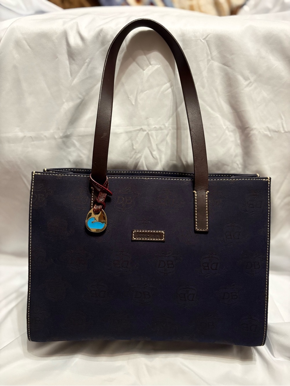 Dooney and Bourke Dark Navy Tote Bag with Brown Handles